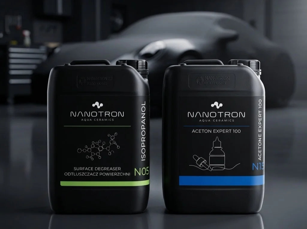 Nanotron Isopropanol 100 i Aceton Expert – kanistry na tle warsztatu samochodowego